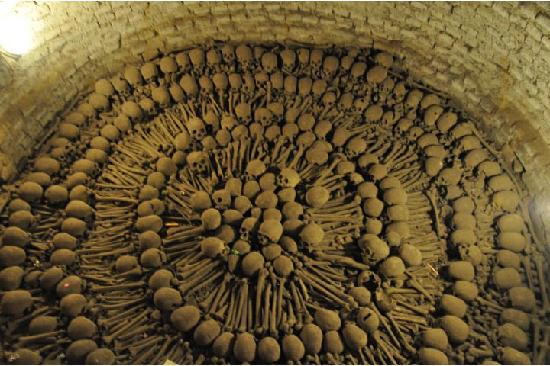 Basílica de San Francisco. One gory feature is its catacombs full of human bones. Back in the day it was the town cemetery. And, yes, that really is a pit with lots of human skulls and bones.