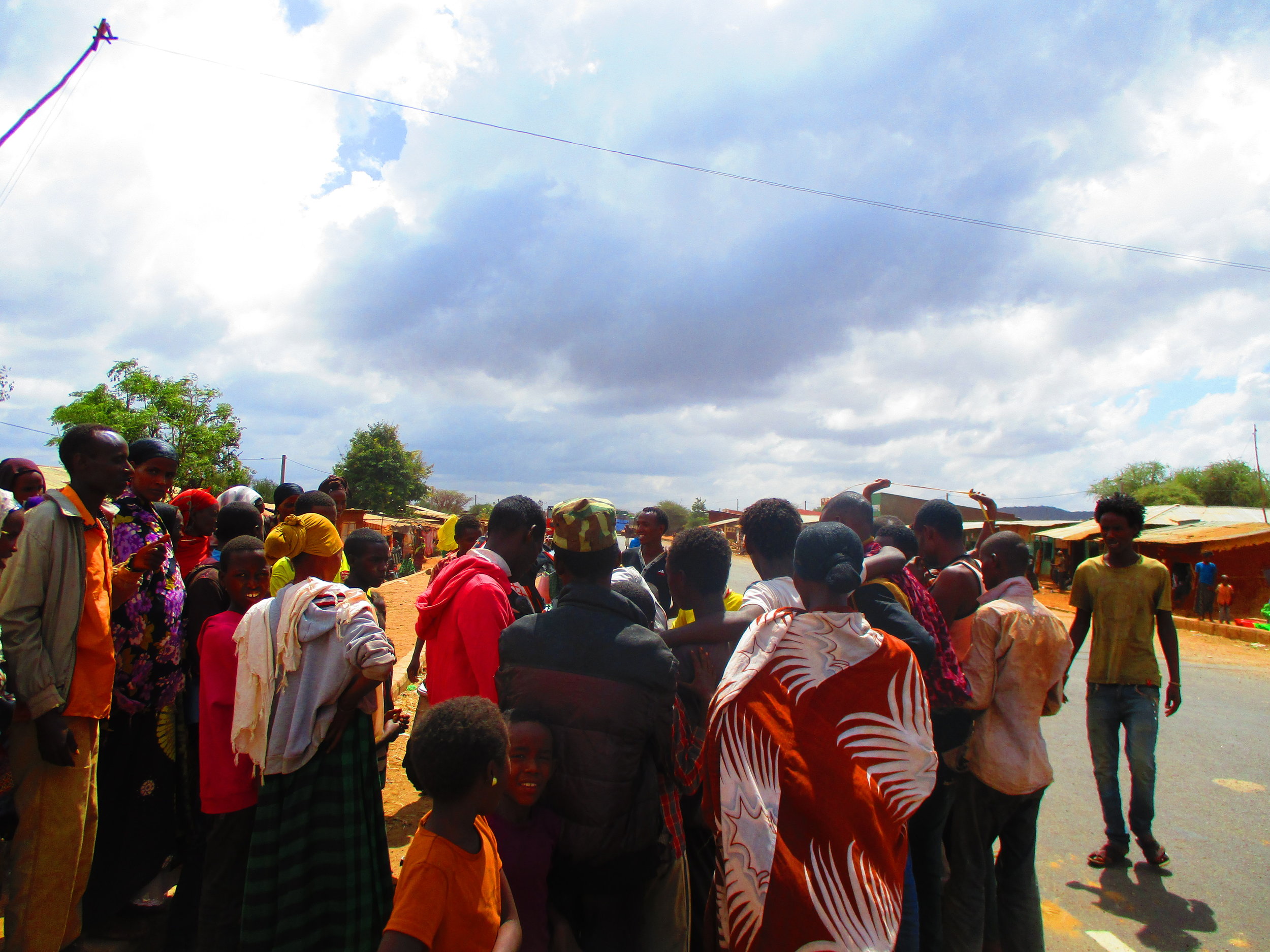 Stopping for petrol from plastic bottles - If you look close you can see me in the middle.