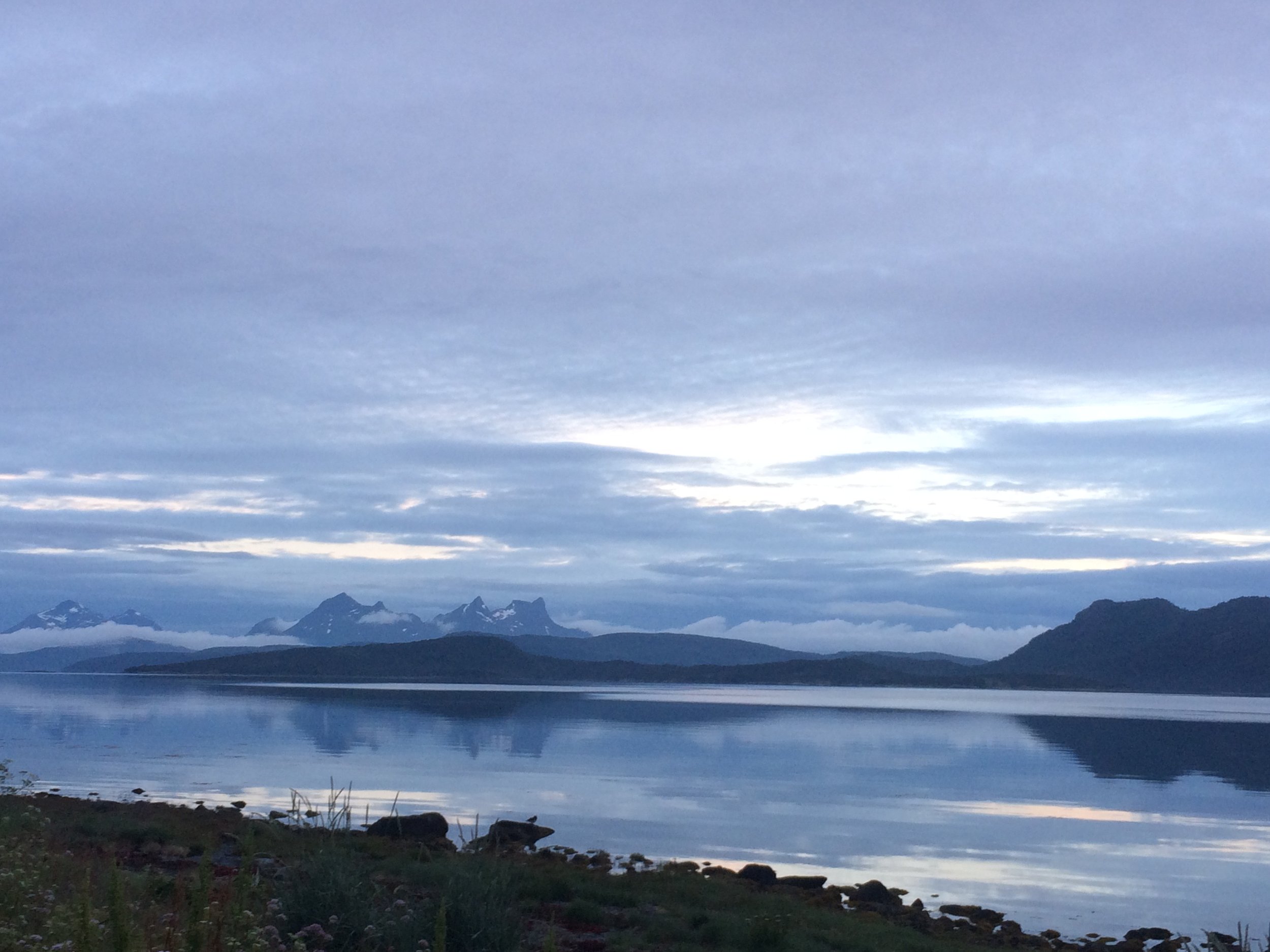 The Midnight Sun over a fjord outside our hut