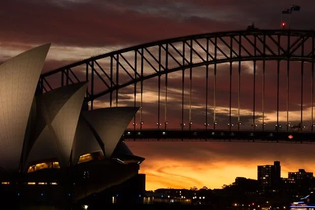 A Warm Sydney Summer Night Sunset Behind The Opera House and Harbour Bridge