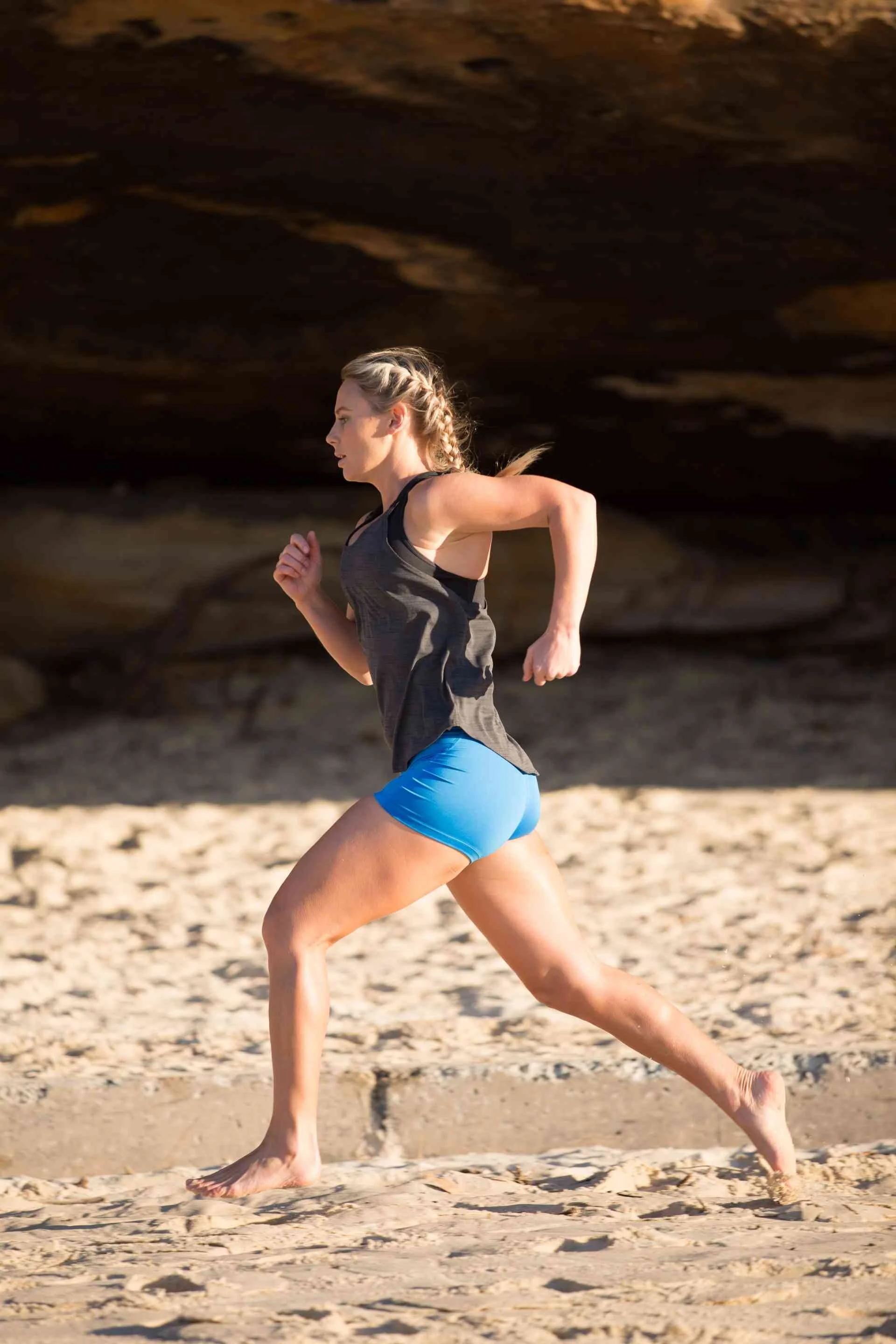 Woman Running On Sand