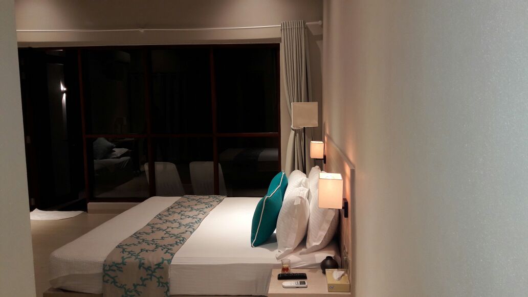 The room and the fruit sticks on the bedside table
