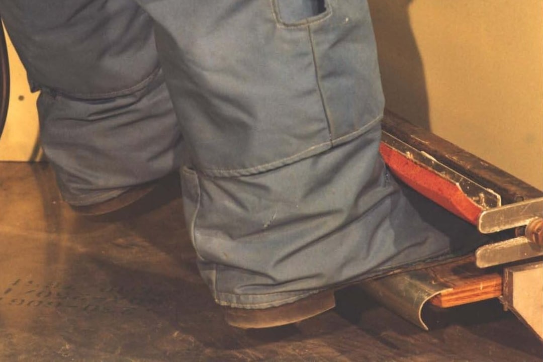 Engineer in space suit demonstrates toe holds in MOL mockup ( NRO MOL photo 11 . Credit: McDonnell-Douglas and NRO).