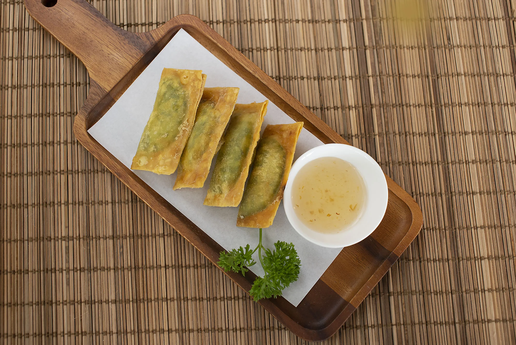 THAI CHEESY WONTON - Deep-fried wonton wrapped mozarella and spinach, served with plum sauce