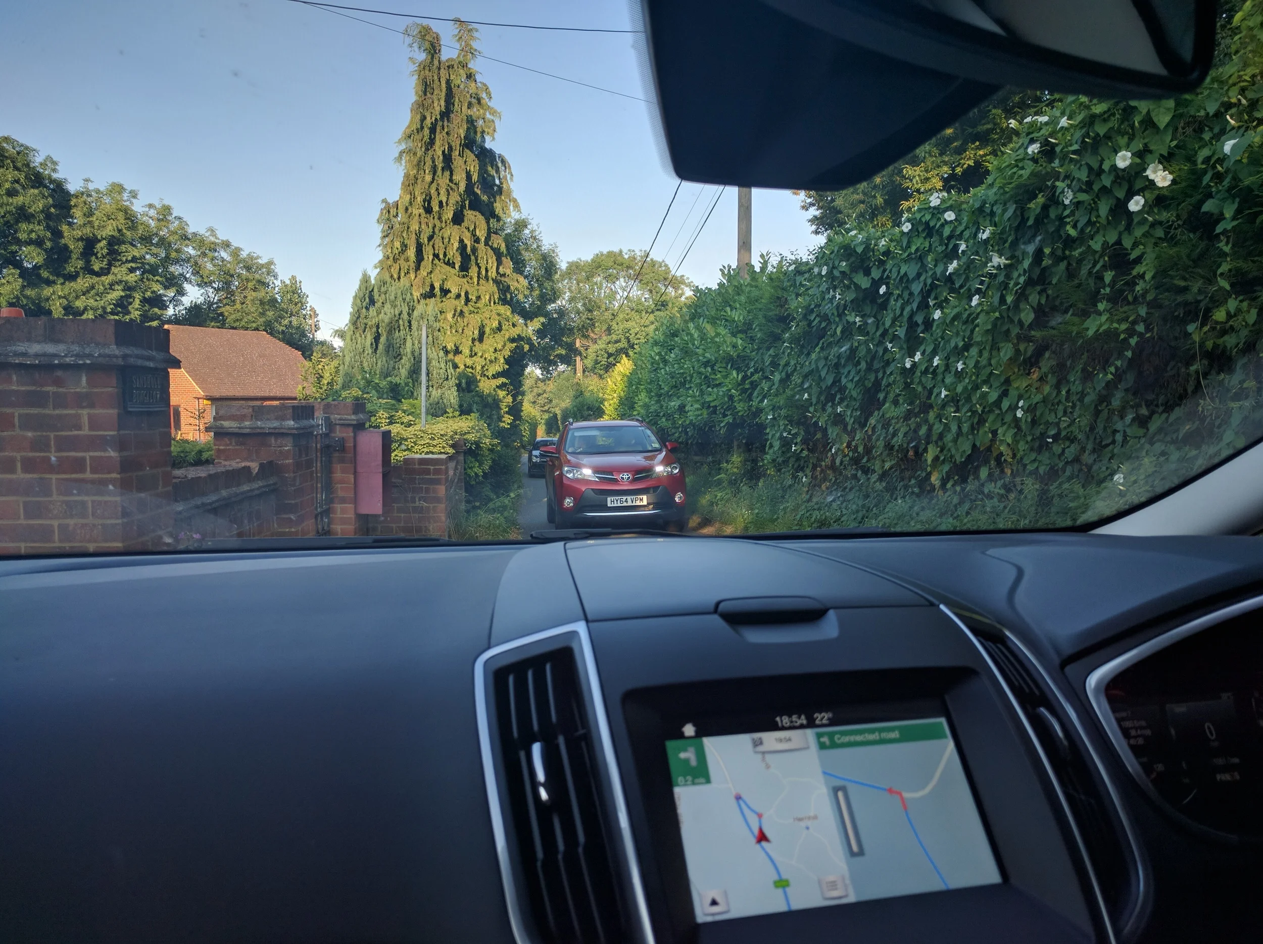 This is what the back roads in England look like! Yes- it's a 2-way road.