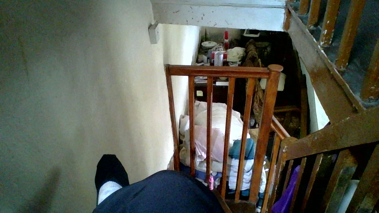 My current view from the top of the stairs looking down into the living room (not really 'livable').