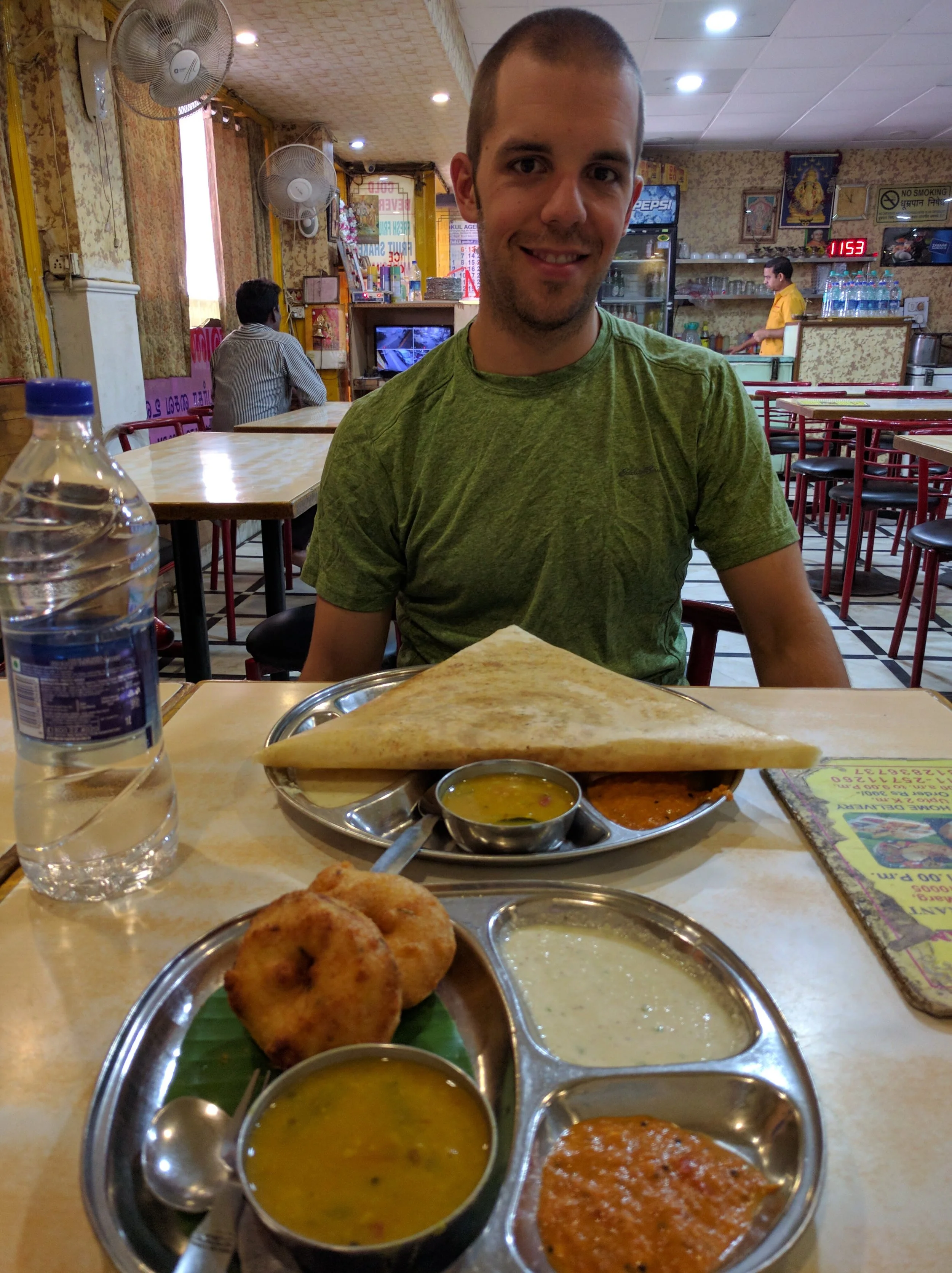 Before coming to here, I don't think Jeff had ever tried Indian food. This picture is of our breakfast in Delhi. We wandered into a vegetarian resturant and ordered vada (sort of a savory donut), and dosa (the large crepe) stuffed with cooked onion. The food came with lentils (the yellow bowl), and 2 other sauces (no idea what they were).