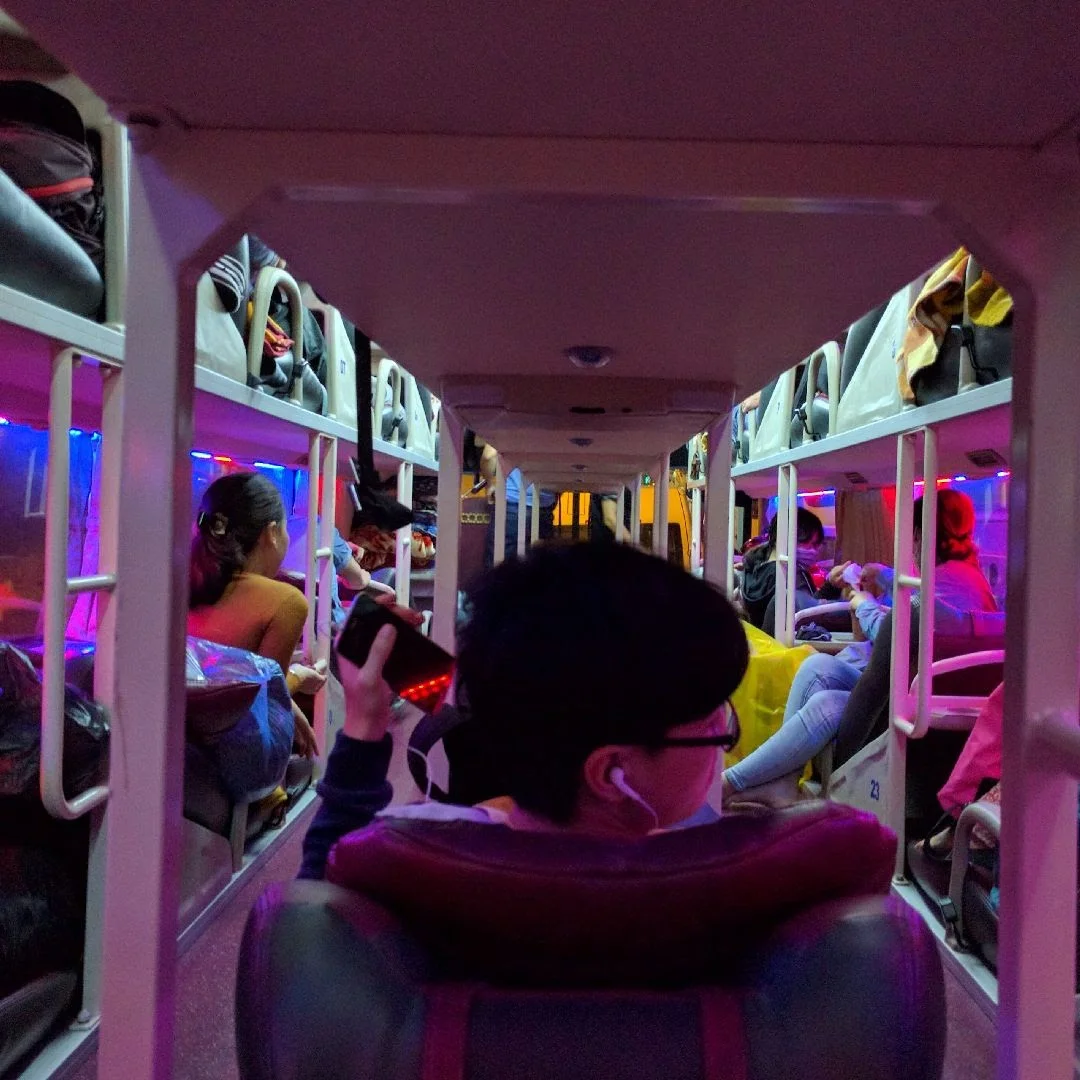 Jeff's view on the sleeper bus- everyone had reclining seats, and the girls grabbed a 3 seater in the back- cozy!