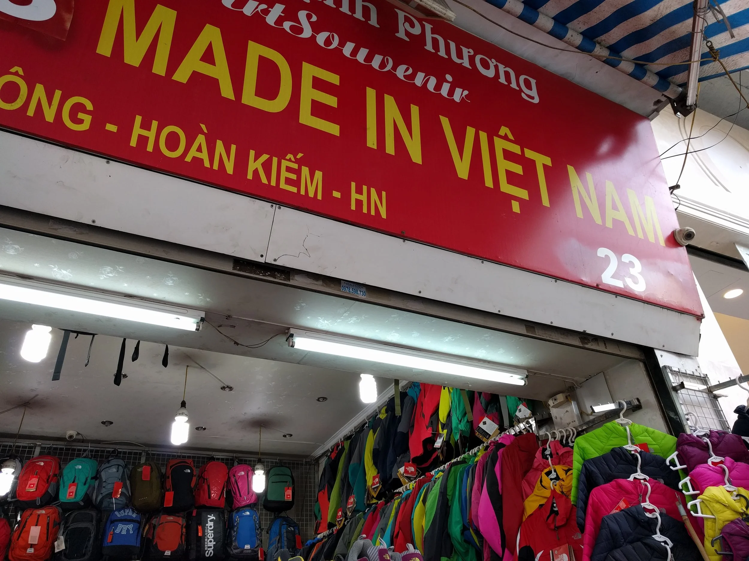 So many name brands are made in Vietnam (like the store above states). Northface and Columbia for sure, and then there were great knock offs of every other brand you could think of. From the quality of some things, they may be the real deal! I know I'm going to have a really hard time paying full price for things from now on. Bri picked up a huge North Face duffel for $20 and Marie got a cute Patagonia messenger bag for $11.