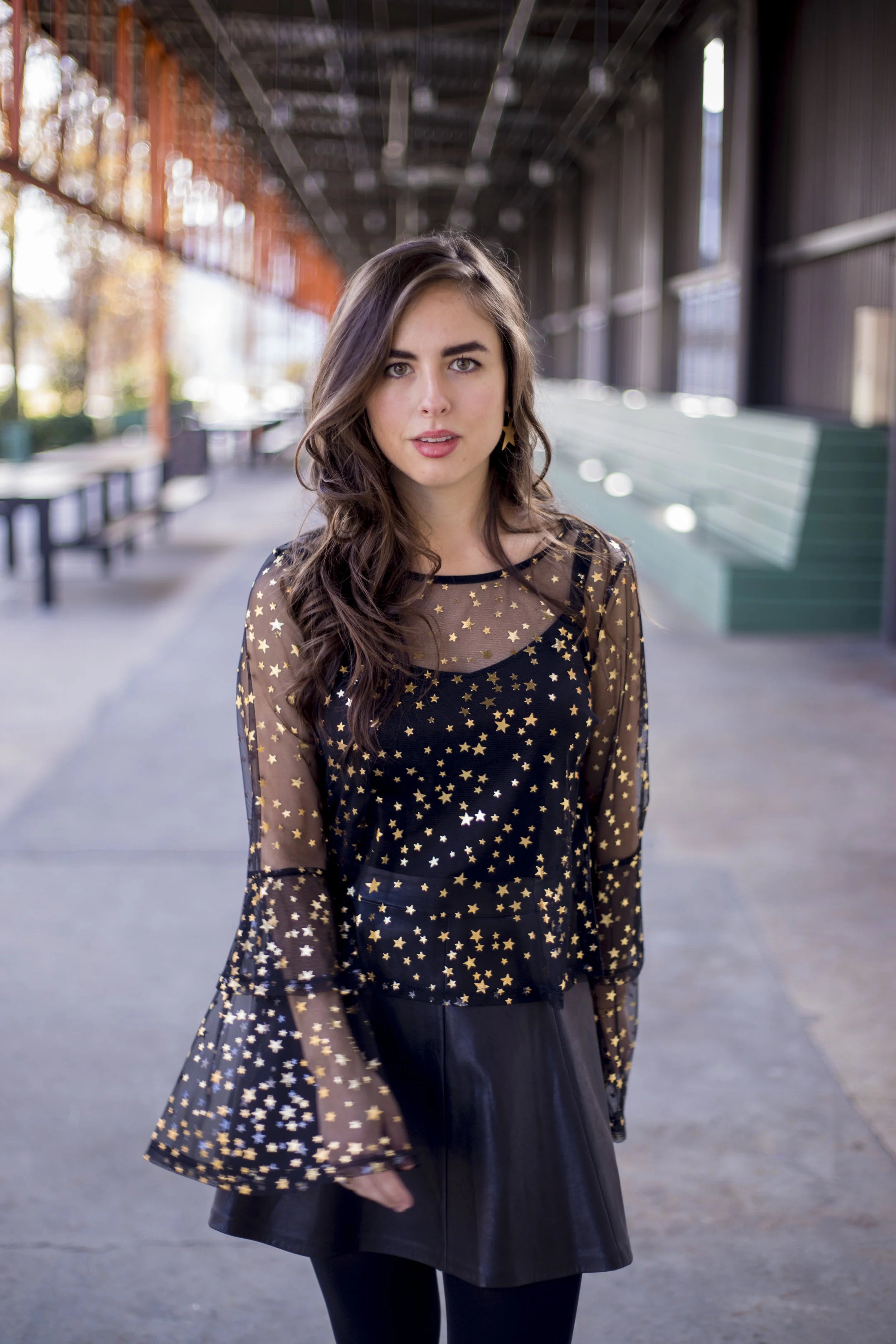If star-studded is how you want to end 2017, try this sheer top featuring more stars than the Milky Way (probably). Pair it with a faux leather a-line skirt and your favorite black booties. Shop similar styles below!