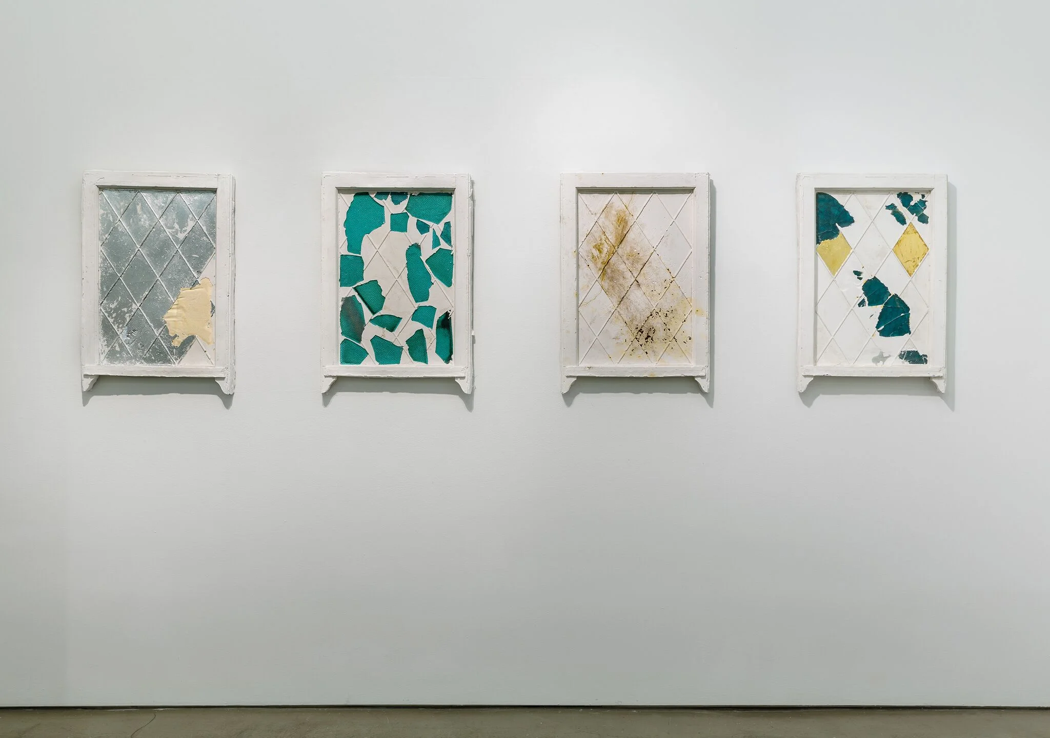 Installation view of hydrocal- plaster windows. Each 30h x 20w in