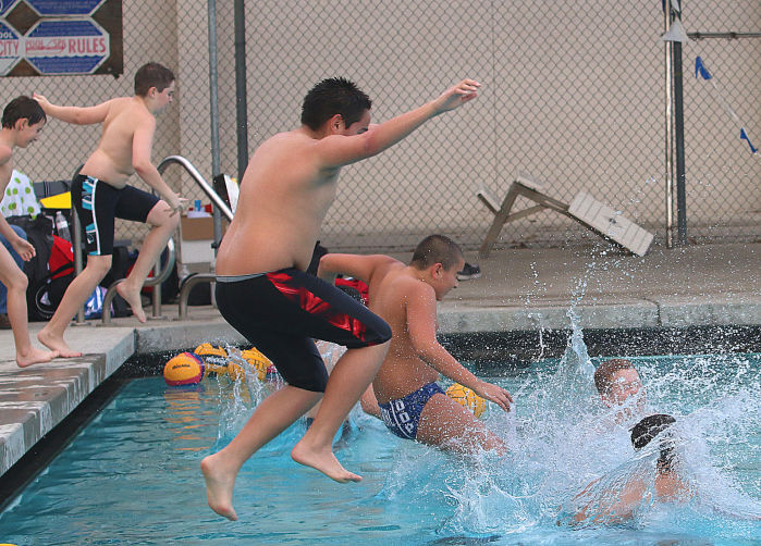 Coaching Kids Jumping In.jpg