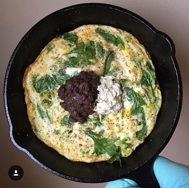 This is a simple simple spinach omelettata topped with Kite Hill Foods chive cream cheese + Better Bean Co. cuban black beans