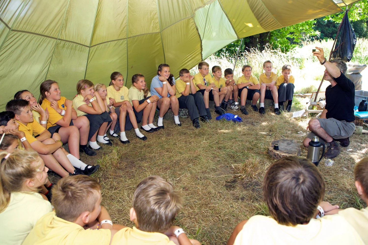Bush craft expert David Hunt shows Castel Primary School children how to make fire using a flint and the fungus King Alfred’s or coal fungus. Photo copyrighted and provided with permission of Sealord Photography, Guernsey.