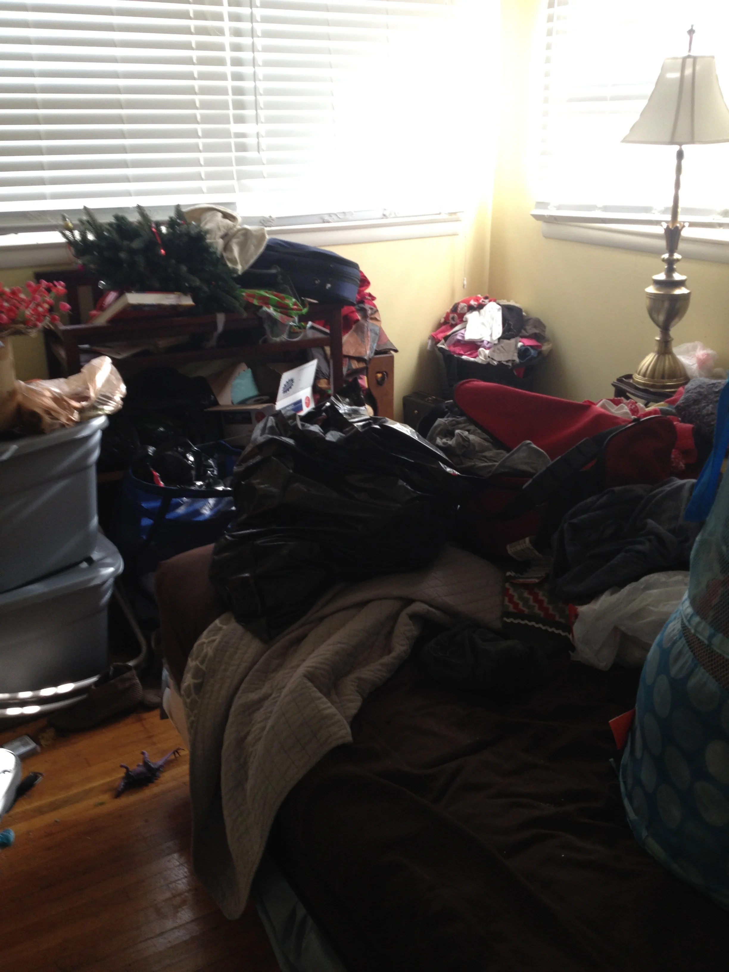 It looks like an unusable room because I just throw things in here and close the door. Boxes and boxes of memories that I don't want to see or acknowledge.