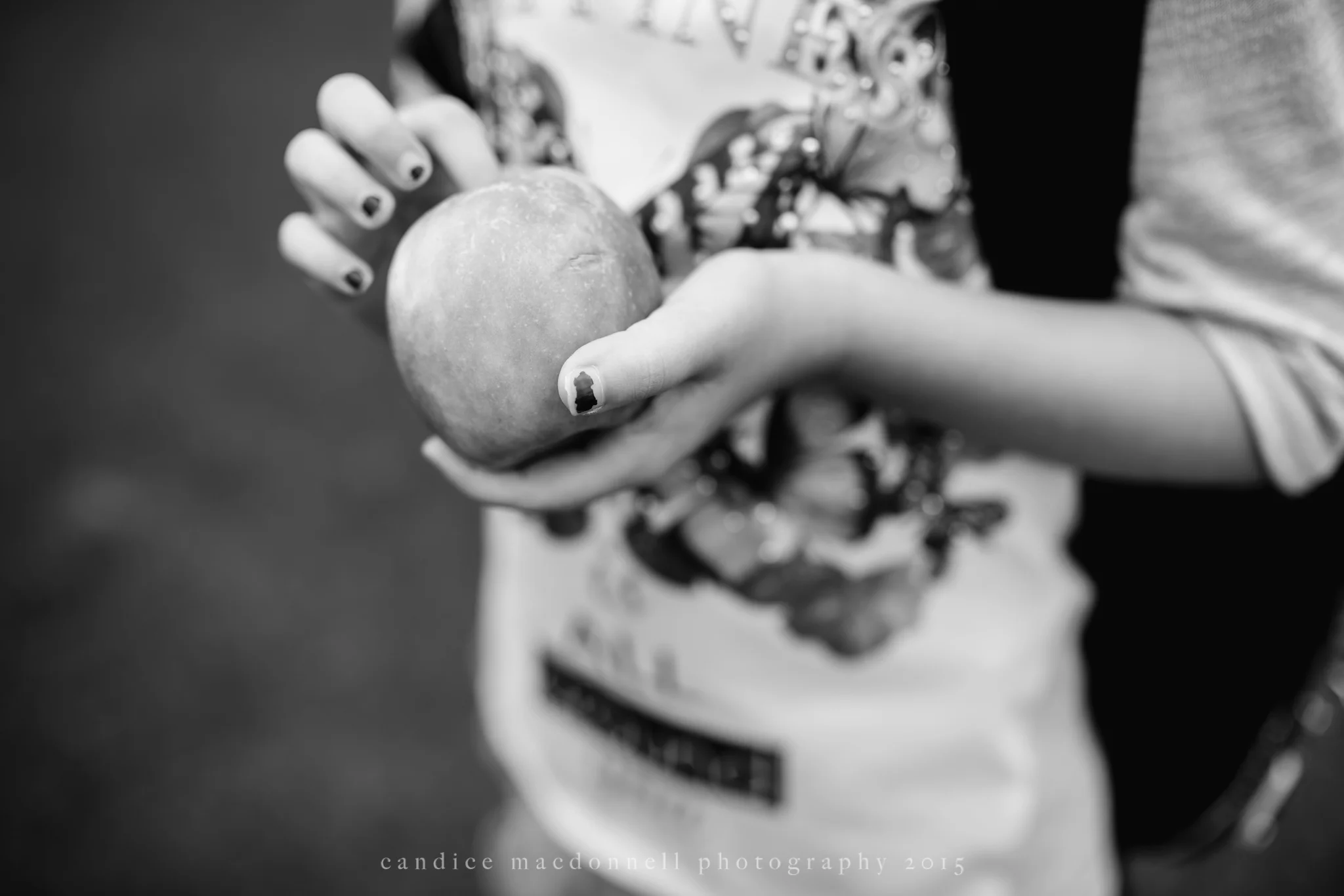 chipped nail polish holding apple © candice macdonnell 2015