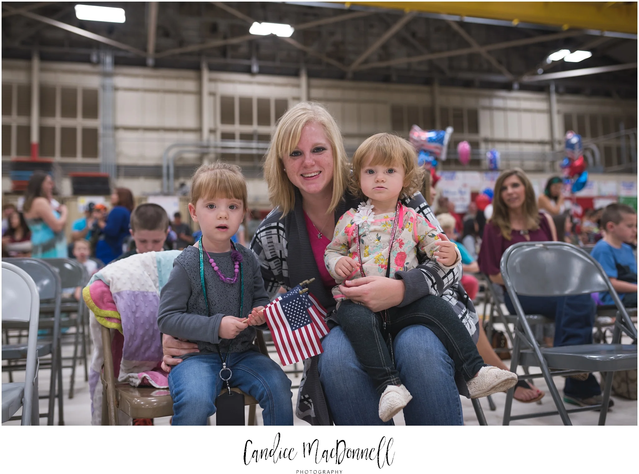 mom and daughters waiting for military homecoming welcome them home hawaii photographer