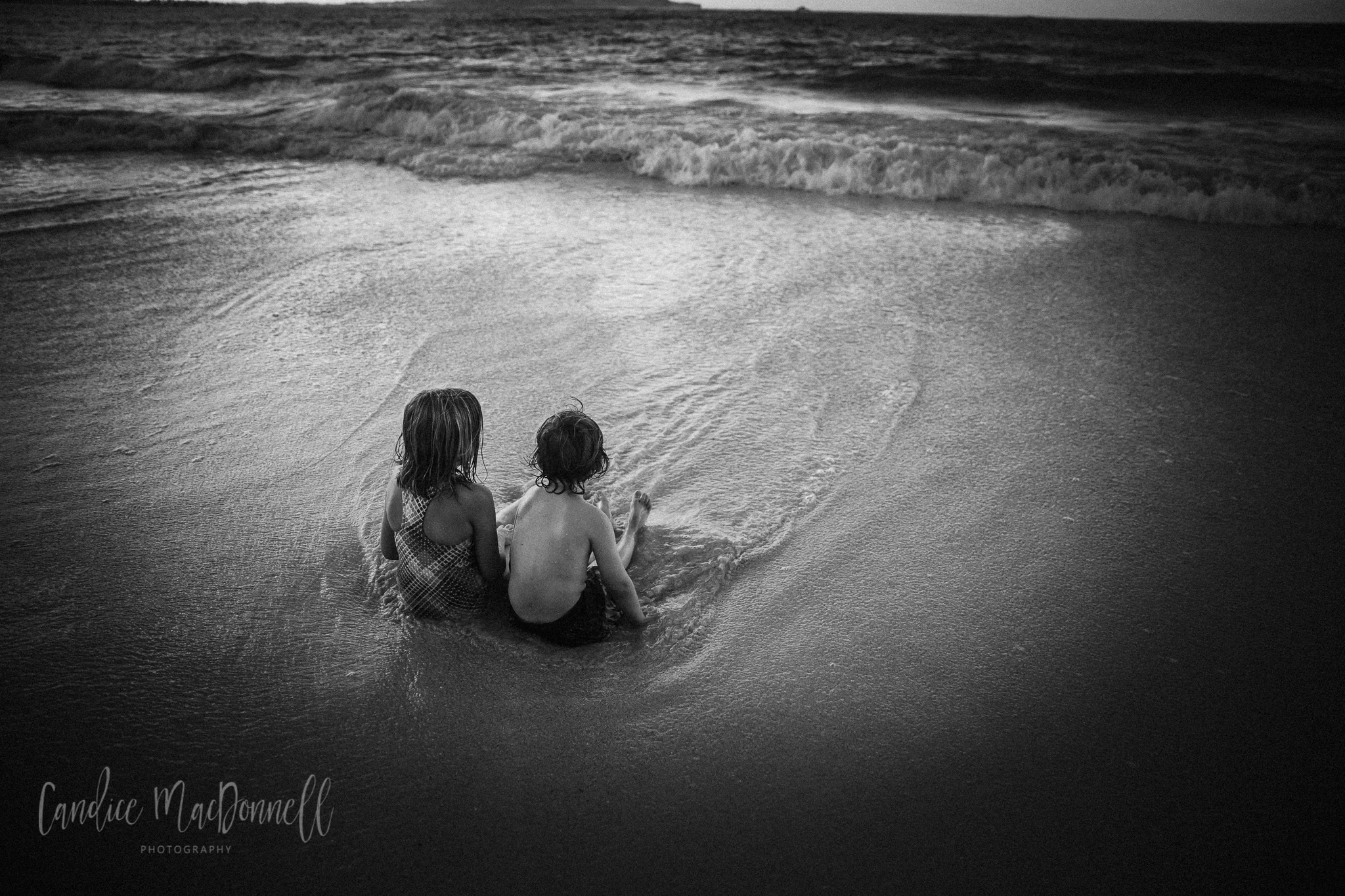 kids sitting in sand at kailua beach oahu hawaii photography