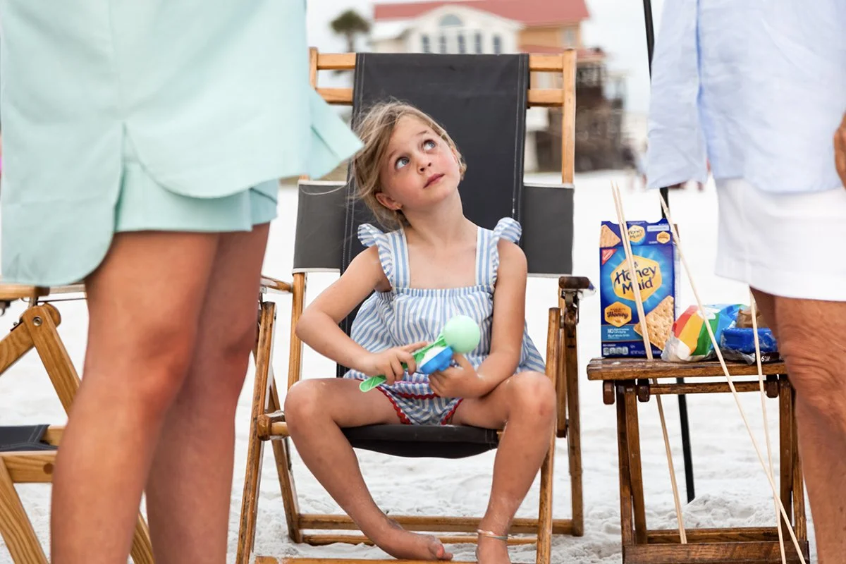Young girl relaxing on a chair during a 30A beach vacation