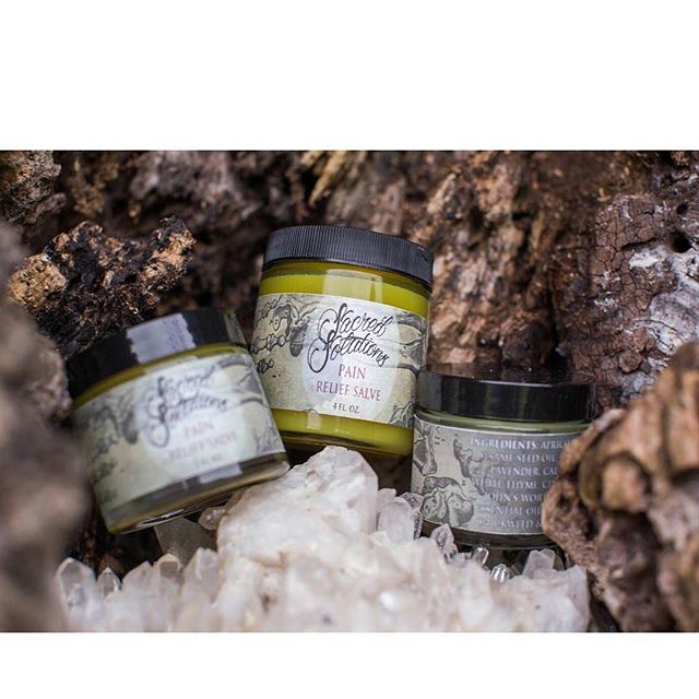 Sacred Solutions Pain Salve is blended with Olive Oil, Arnica, and Ginger to sooth those sore muscles and aching bones, or in my case, neck, shoulders, arms, and hands! 
Great after a long day of tattooing, hiking, paintball, or whatever makes you sa