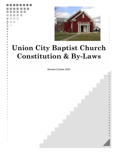 Cover page of a document titled 'Union City Baptist Church Constitution & By-Laws', revised October 2023, featuring a photo of a red church building with white trim and a green lawn.
