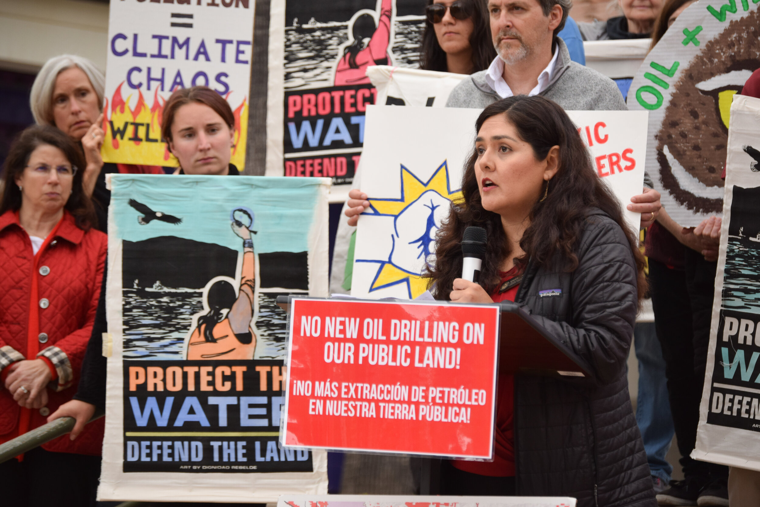  Graciela Cabello, Director of Youth and Community Engagement for Los Padres ForestWatch, leads a rally outside of a Bureau of Land Management Hearing on opening up public lands to oil drilling.  
