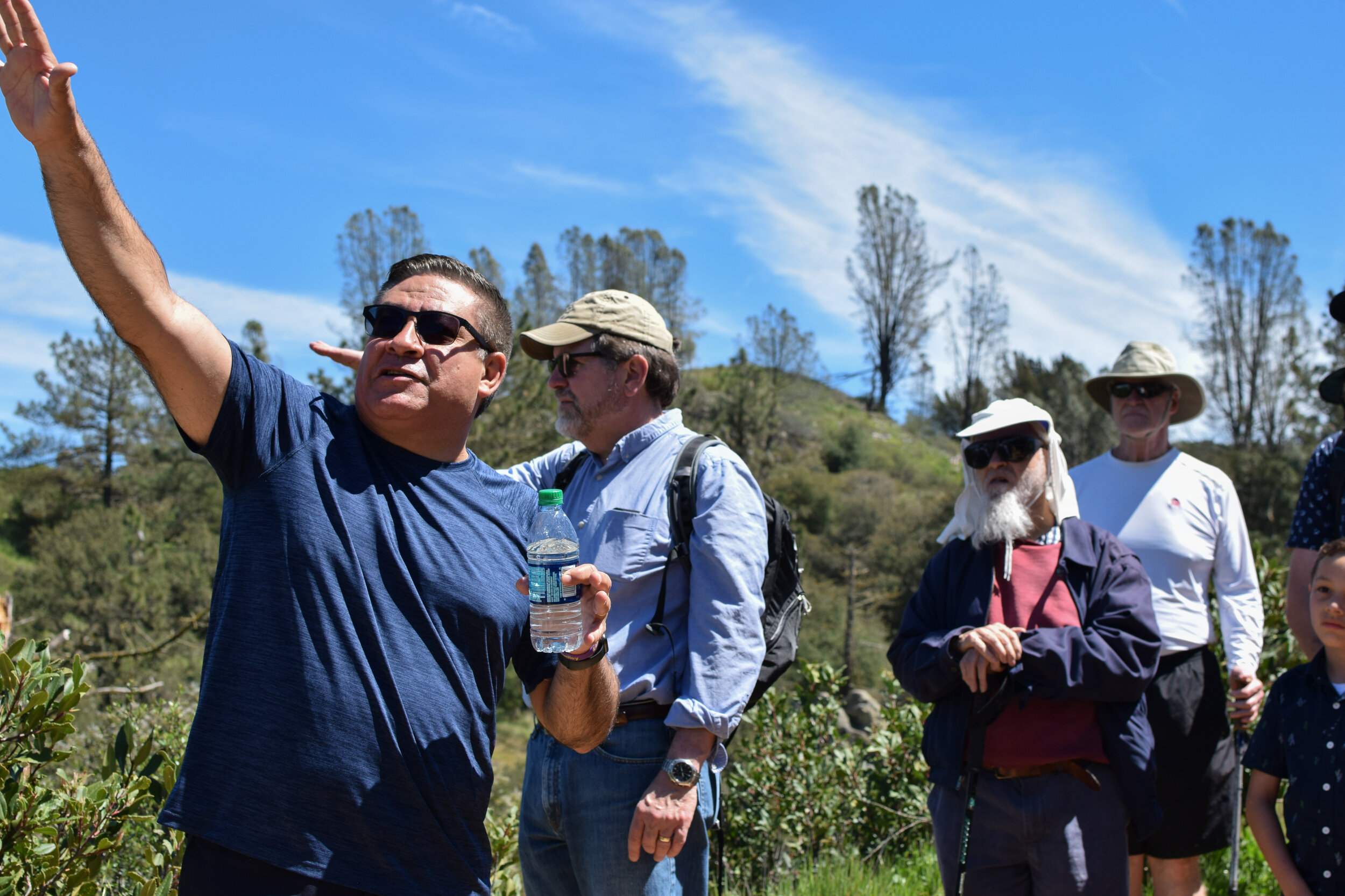  Representative Salud Carbajal admires the surrounding environment at the Los Padres National Forest on a hike with constituents.  