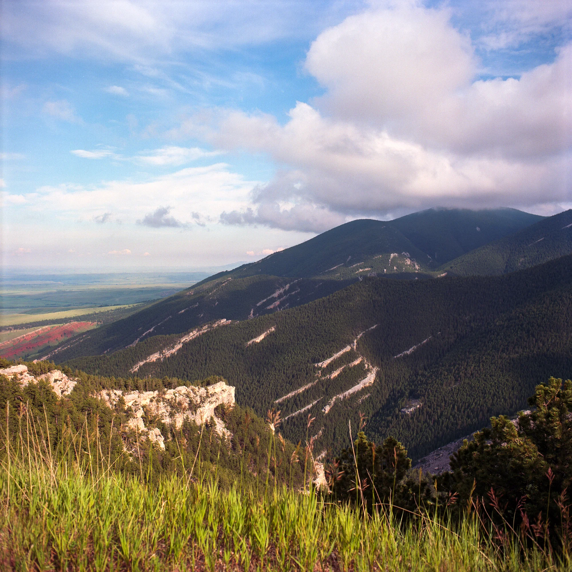 The mountains were capped by clouds, and plains awaited us in the distance.