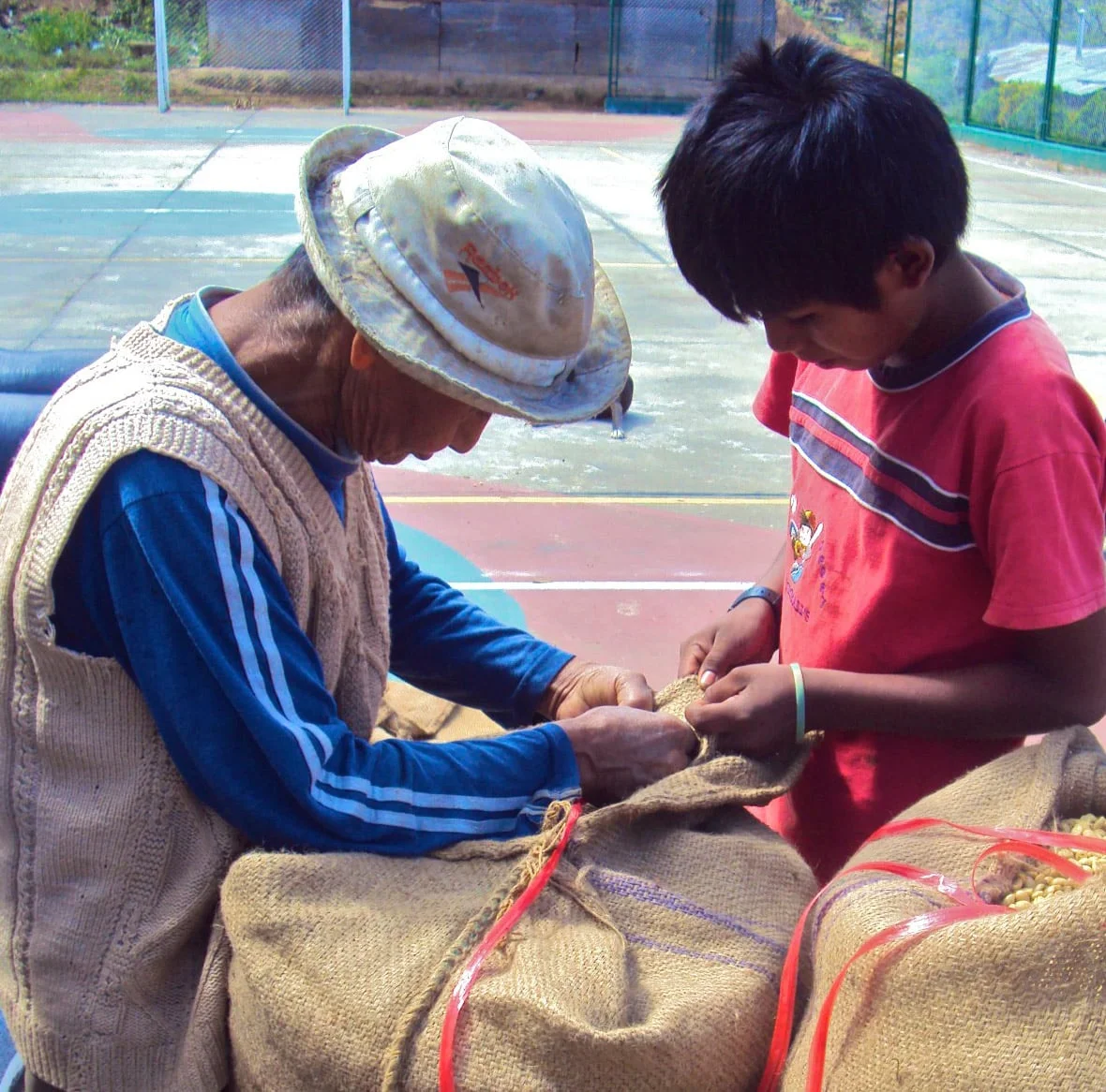 Green coffee man and child.jpg