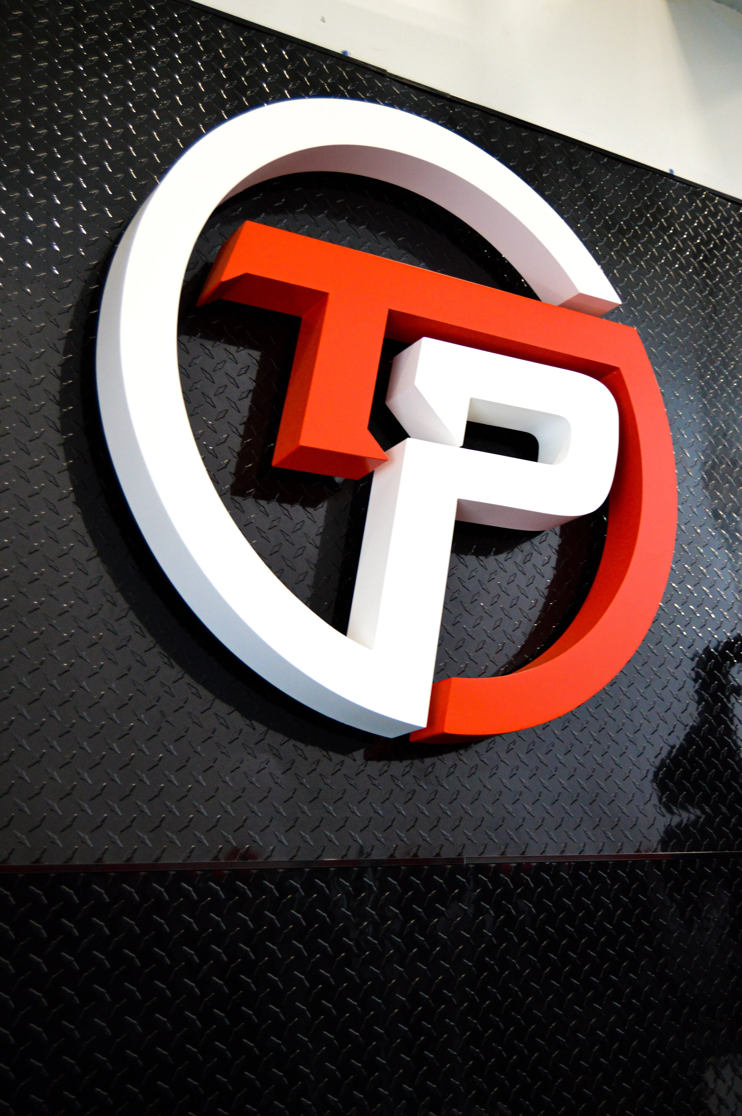 TP LOGO IN GYM .jpg