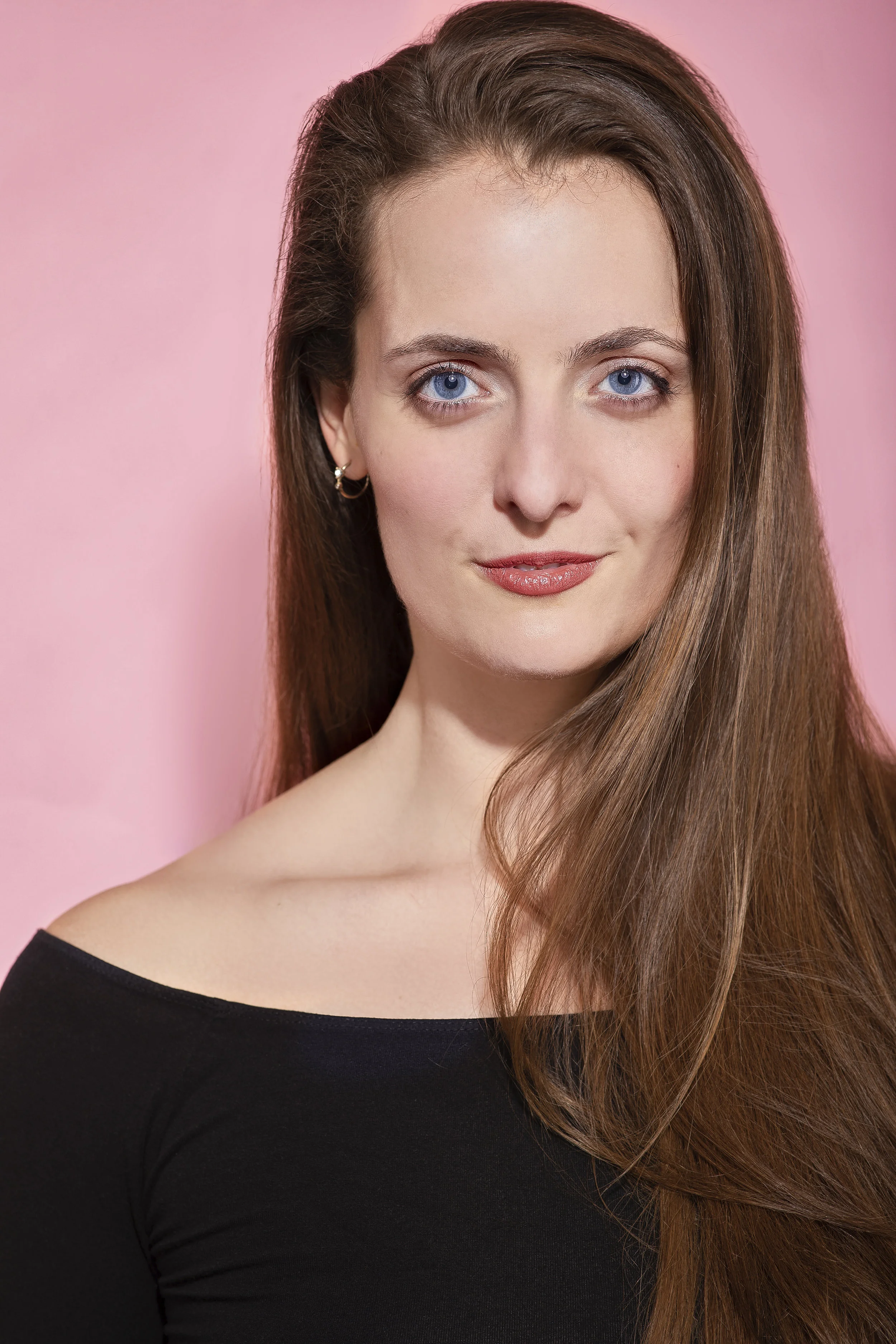 Laura Vogels HeadshotPink.jpg
