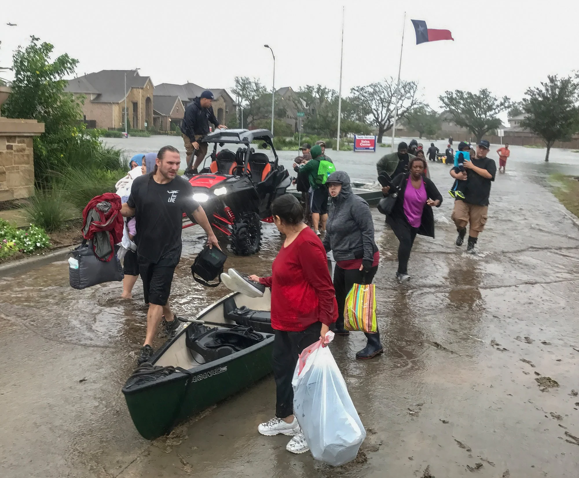 Residents flee high waters of Hurricane Harvey.