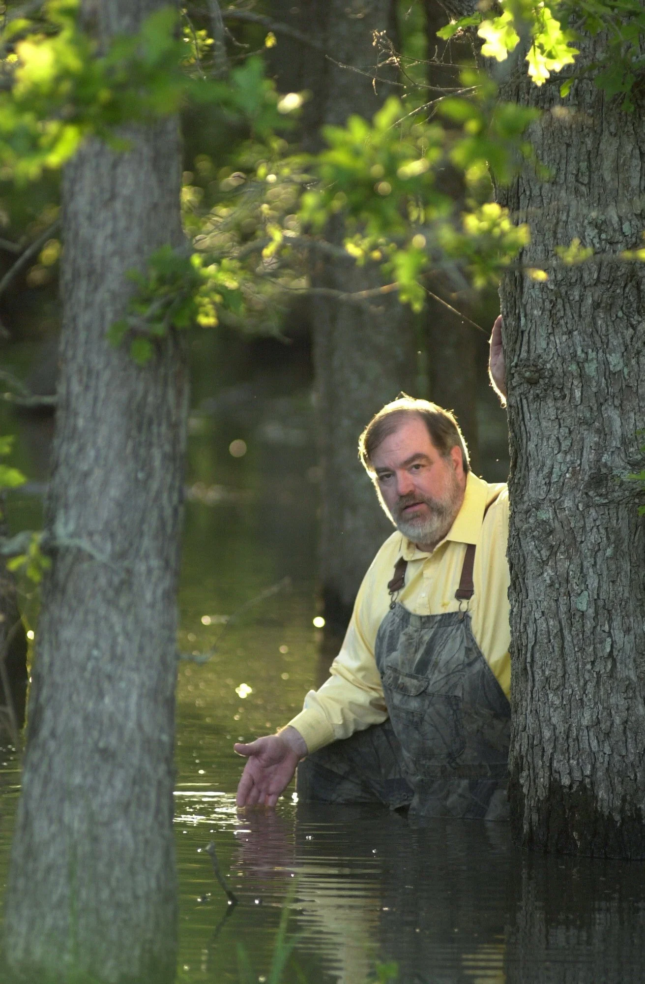 Dr. Robert McFarlane in Neches River bottom
