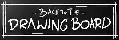 Black sign with white informal lettering reading: Back To The DRAWING BOARD