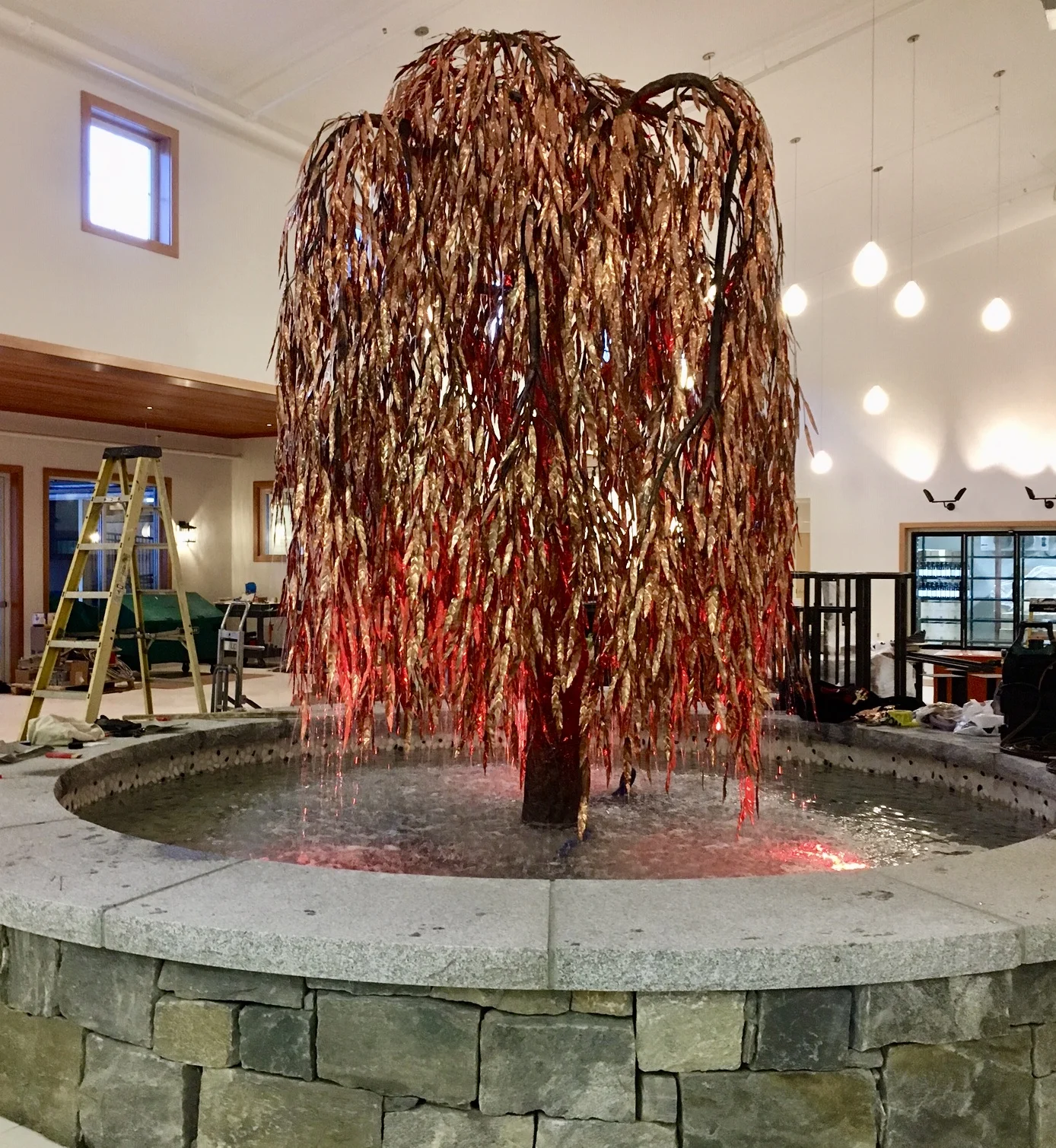 The giant Willow Tree Fountain stands 16.5 ft. and is the focal point at the Maine Beer Company in Freeport Maine. This photo was taken just after it was installed. A very special tree to appreciate as one enjoys one of the best breweries around.