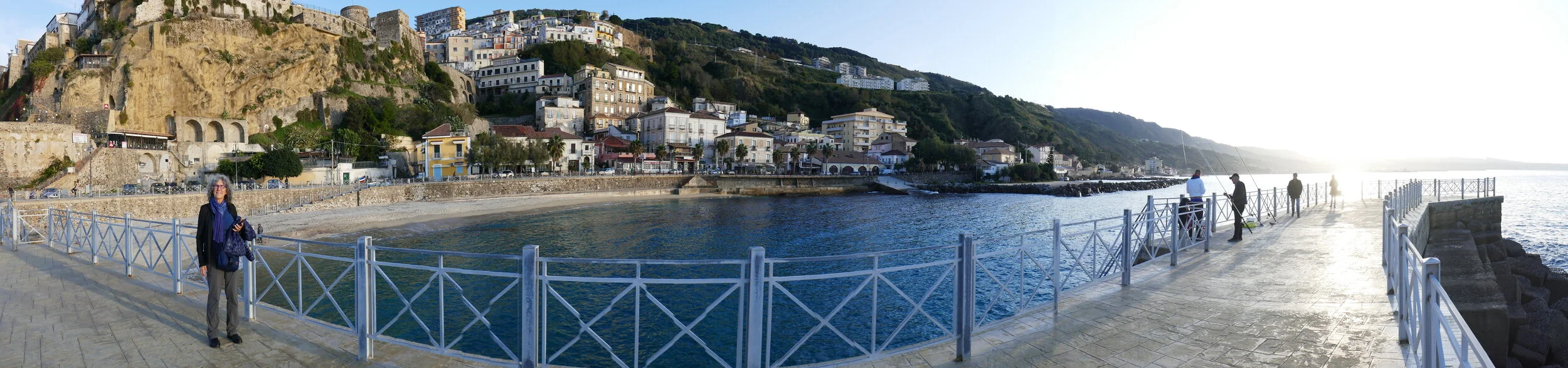 Louise on the Pizzo seaside promenade with fishermen. In fact, Pizzo is known as a fishing village, especially for its tuna and coral.