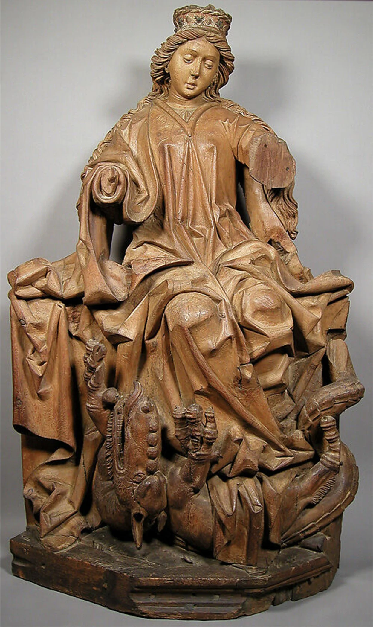 Saint Margaret, 1470-1480, Pine with metal appliqués, traces of gesso and paint,  Workshop of Michael Pacher (Austria, South Tyrol now Italy, active by 1462/3–died 1498), 50 3/4 × 31 × 13 1/2 in. 