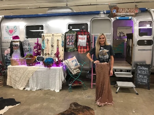Brooke and her Soul Revival Boutique set up in her Airstream