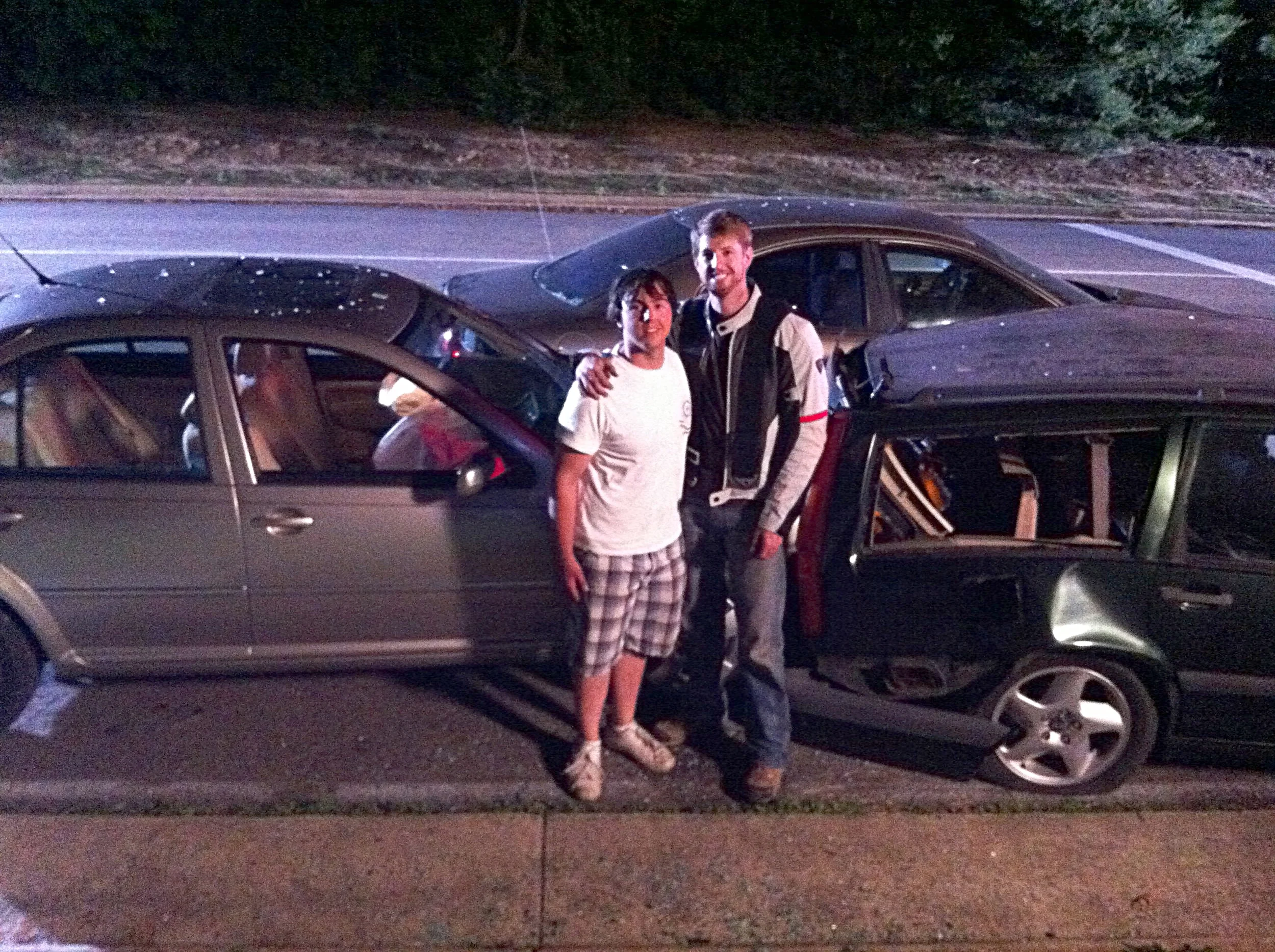 Here's a super grainy photo of Morgan and I on set after I smashed a bunch of cars up. Yeah, the iPhone couldn't capture twilight shots in 2011 either. 
