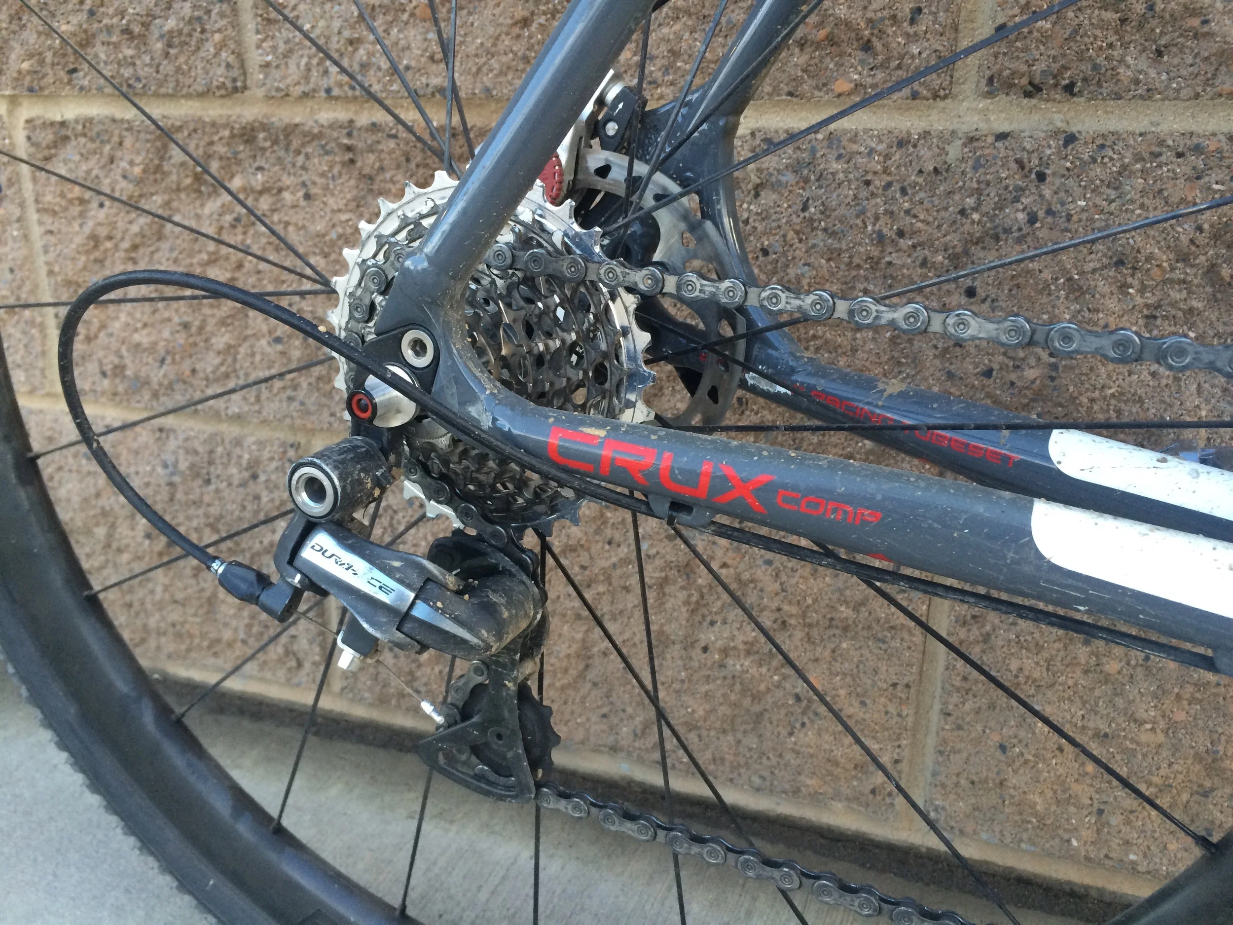 10 spd Shimano derailleurs and shifters with a fancy SRAM Red 11x32 cassette. It's not supposed to work but it does.