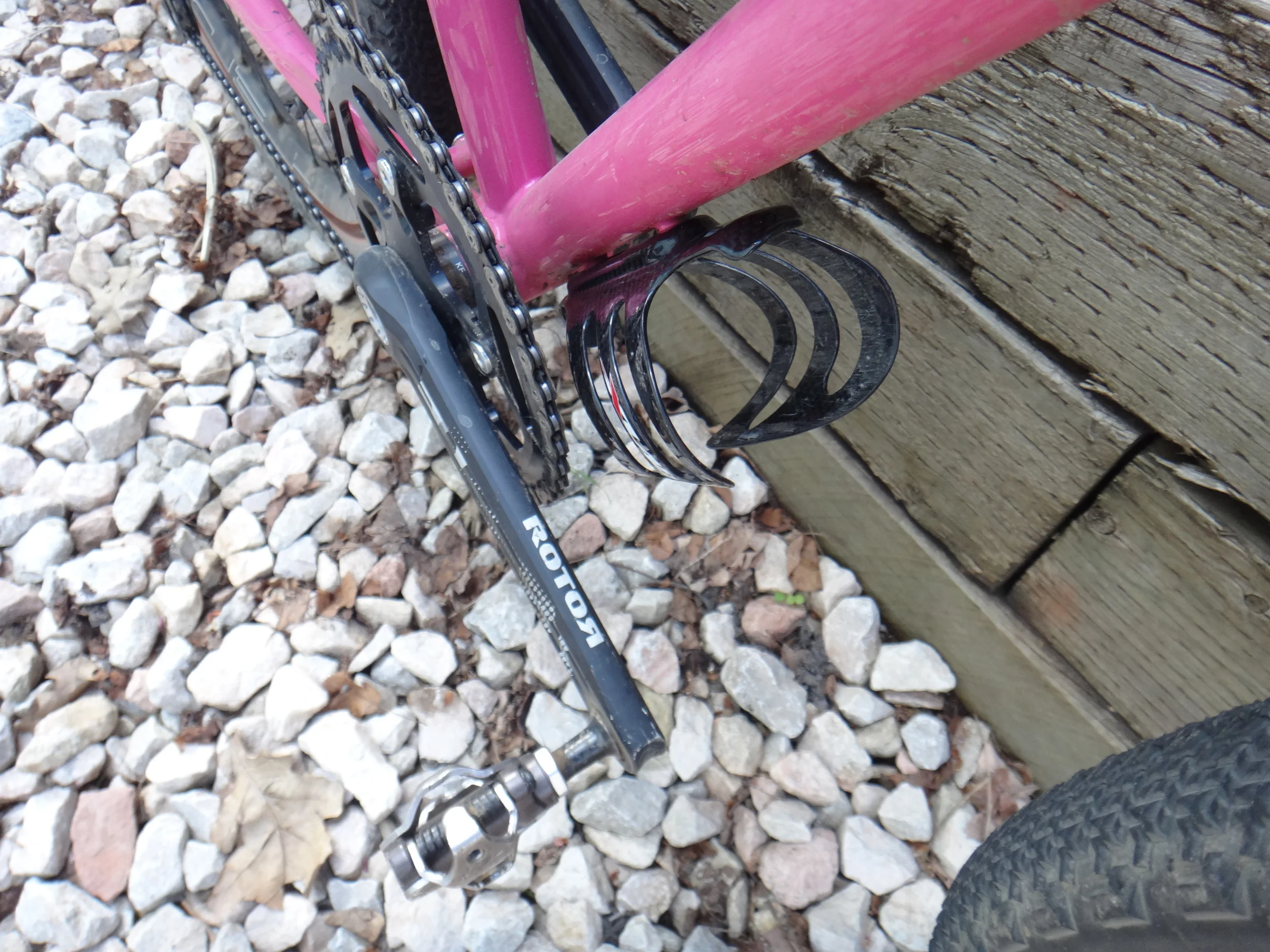 A cage just clears the 44T ring. I'm using an XLab Gorilla cage for the underside of the down tube location. Both the Gorilla and Chimp cages from XLab hold onto a bottle incredibly well. Haven't lost one yet with them!