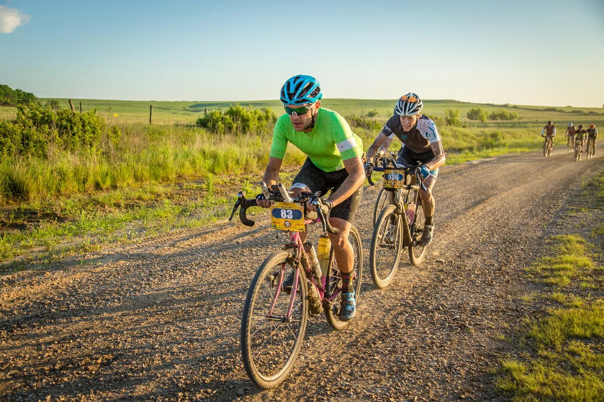 Me with Mike on my wheel near the start of the 2016 Dirty Kanza. Soon he rocketed past and set a new PR! (Photo by Linda Guerrette)
