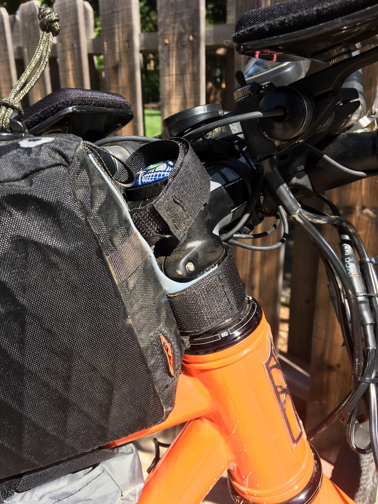 Dual front straps keep the tall bag nice and stable. 