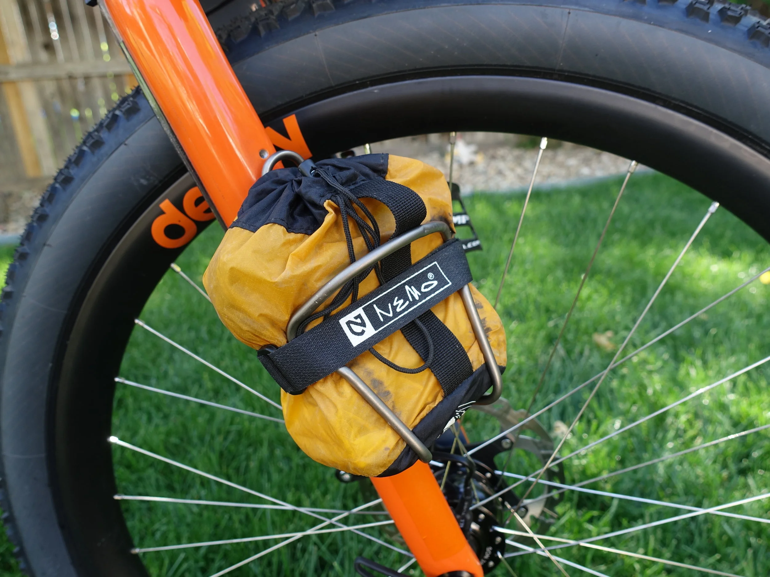 I'm carrying most of my spares kit here this year. It's super handy and keeps weight low. In a pinch I can also put it in my seat bag and use it to carry a 5th water bottle. 