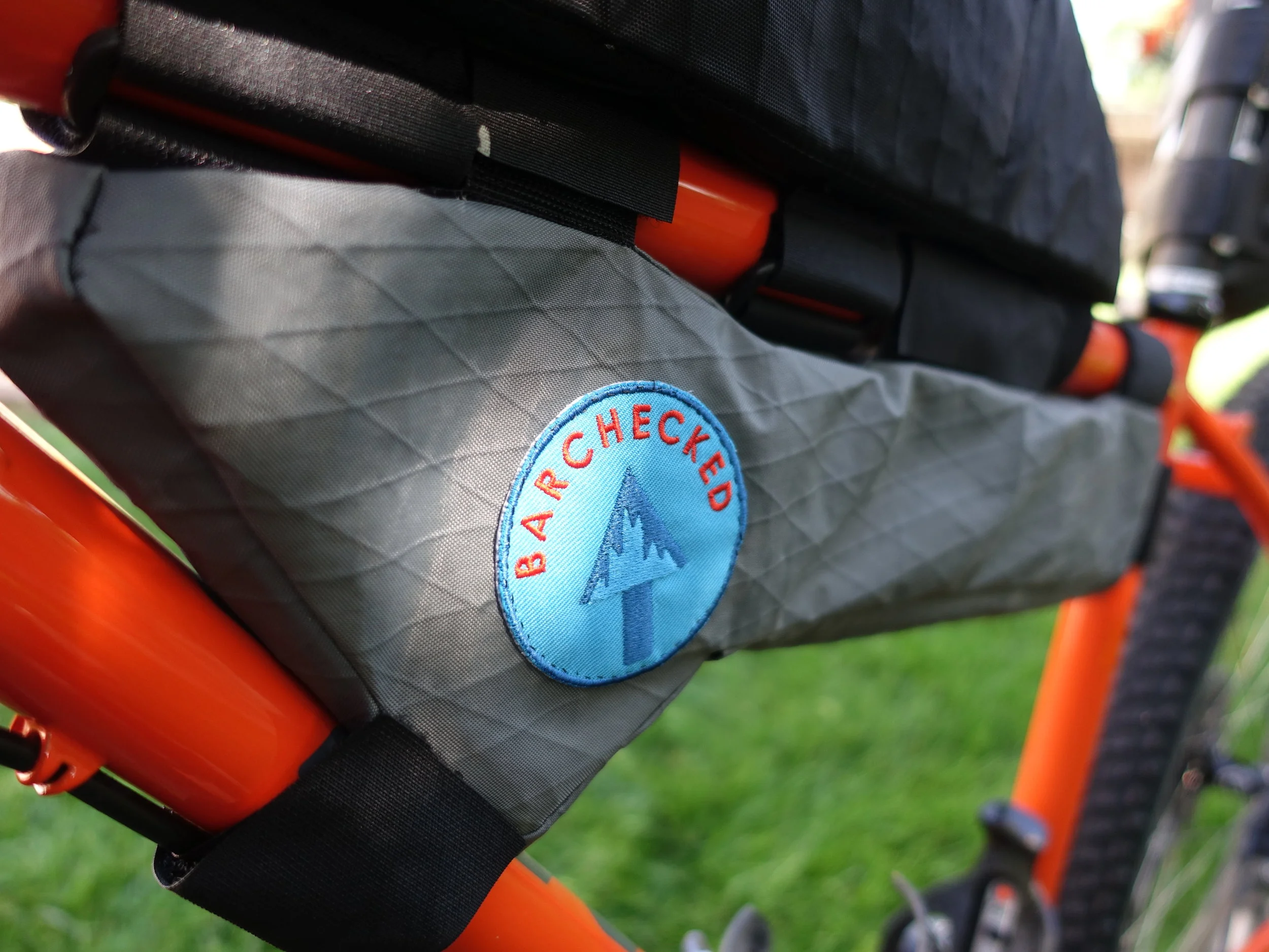 Our riding crew is lead by the Barchecks, Aaron and Liz, who had a knack for ruining legs with gnarly rides. Once you've survived a few rough days, you can earn your "Barchecked" merit badge. A reminder to smile through the pain!