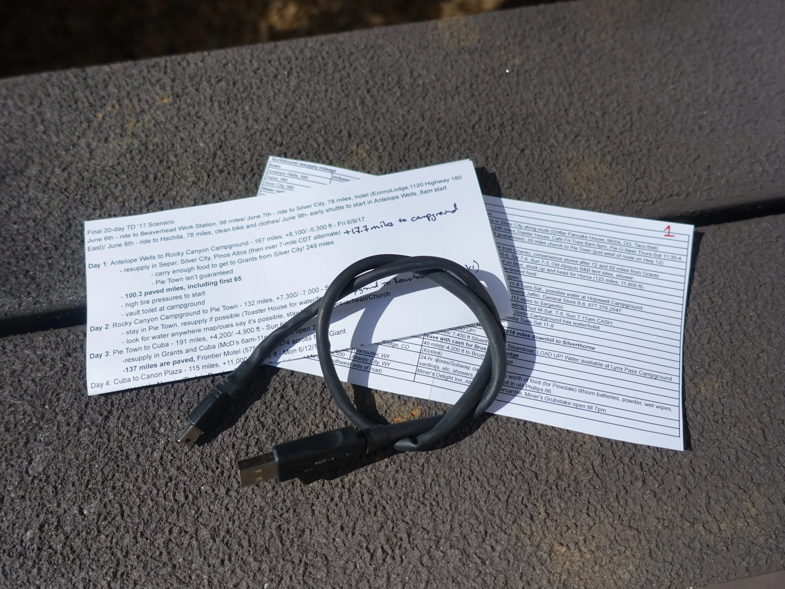 Info overload is entirely possible when prepping for 2,700 miles of self-supported racing. I put together 2 documents to help me with pacing and resupplies. The pacing notes may go straight into a trash can if weather throws me some big curve balls. But doing the research required to make them was extremely educational. I also carry all the cables necessary to reboot and upload to my Garmin GPS devices. 