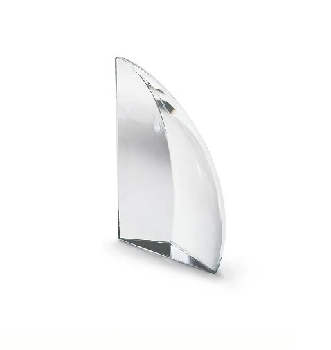A clear, curved glass award or trophy with a smooth, polished surface standing upright on a white background.