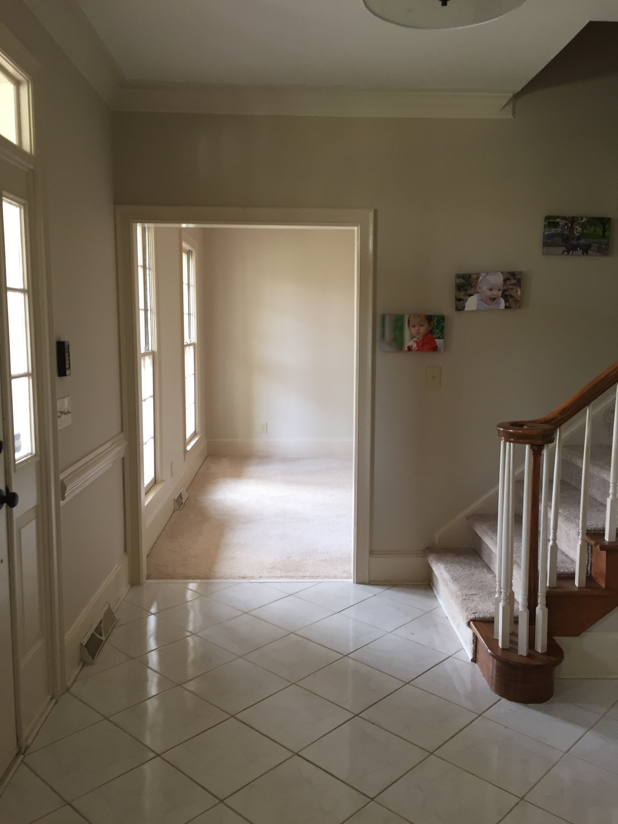 Foyer with a view into the formal living room.