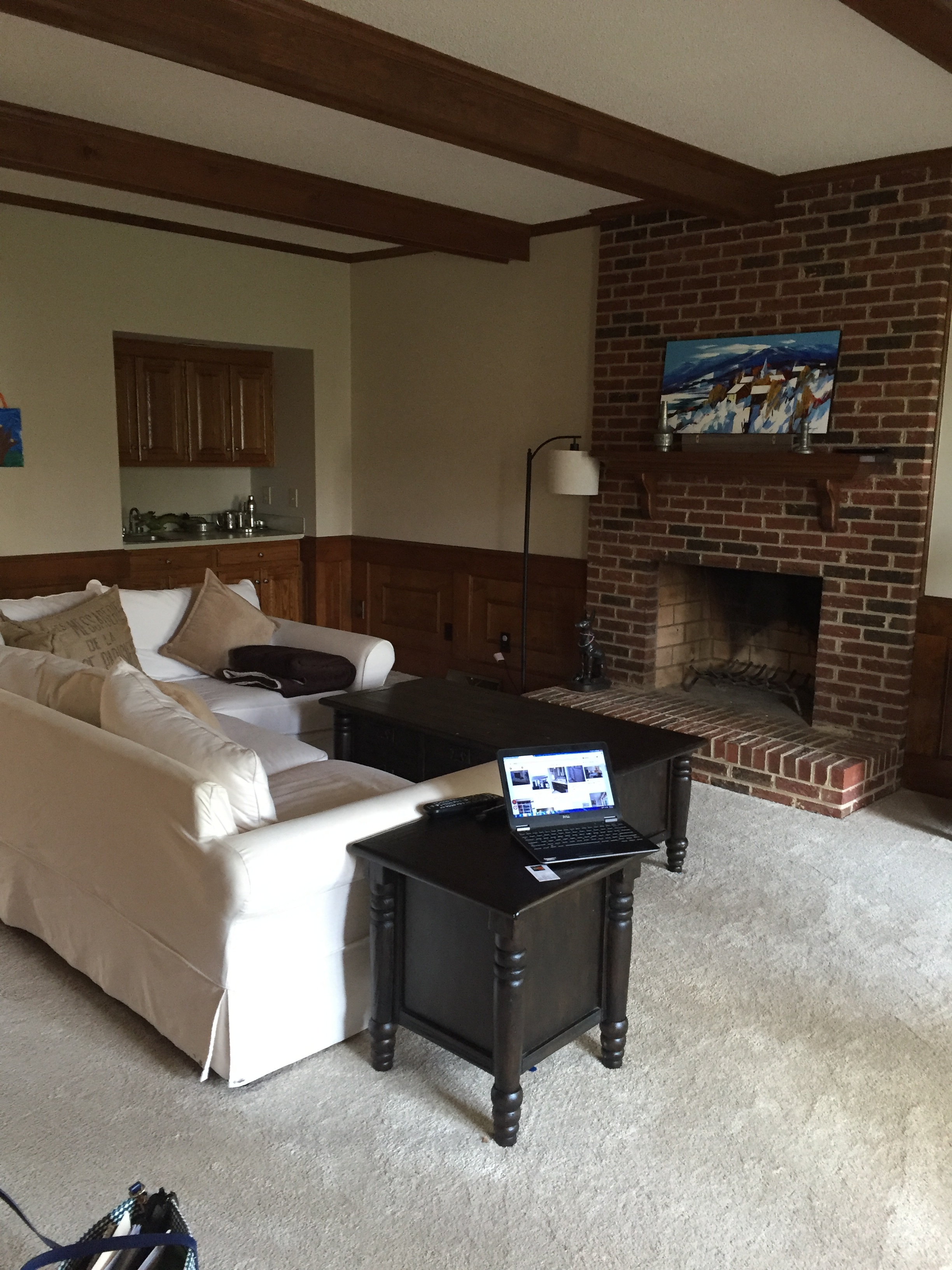 Family room, just off to the right of the foyer (featuring a swanky 80's wet bar, lol!) and an awesome all brick wood burning fireplace.