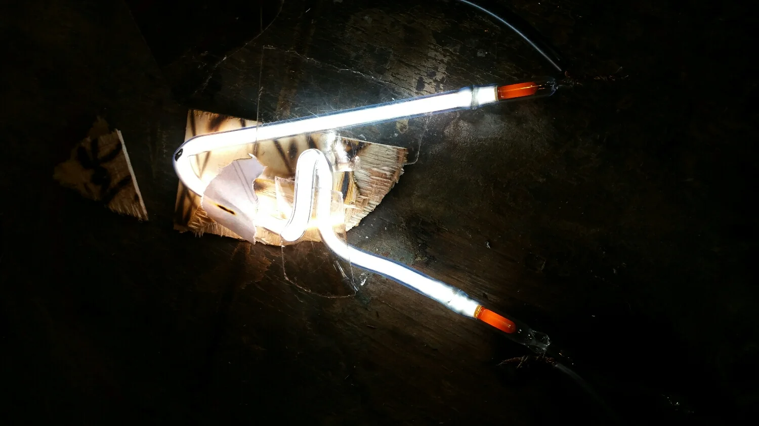 "A" being processed with electricity, creating heat.